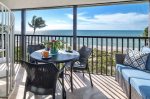 Screened lanai with direct beach view